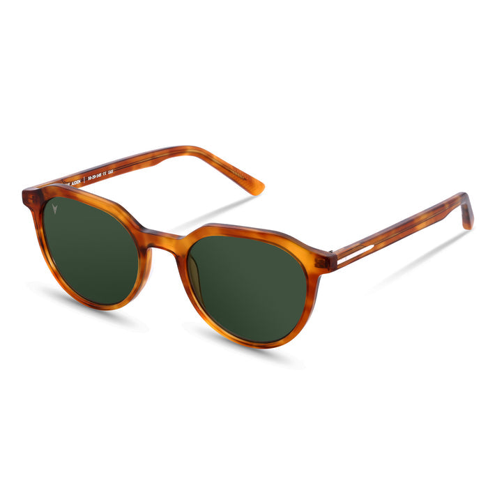Sunglasses with tortoiseshell frame and dark lenses on a white background