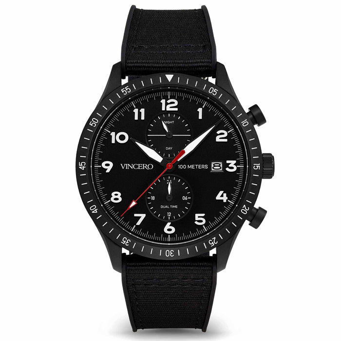 A black analog watch with a case diameter of 43mm, a sapphire crystal glass, and a black nylon strap, displaying a night sky motif with luminous hands and.indices.