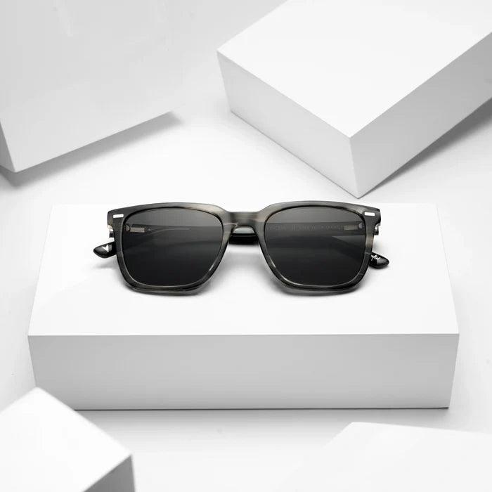 Sunglasses on a white geometric background