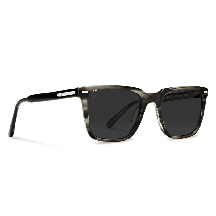 Sunglasses with dark lenses and black frame on a white background