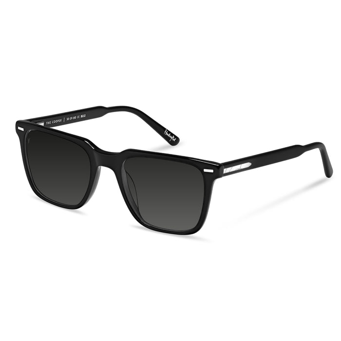 Black sunglasses with gradient lenses on a white background