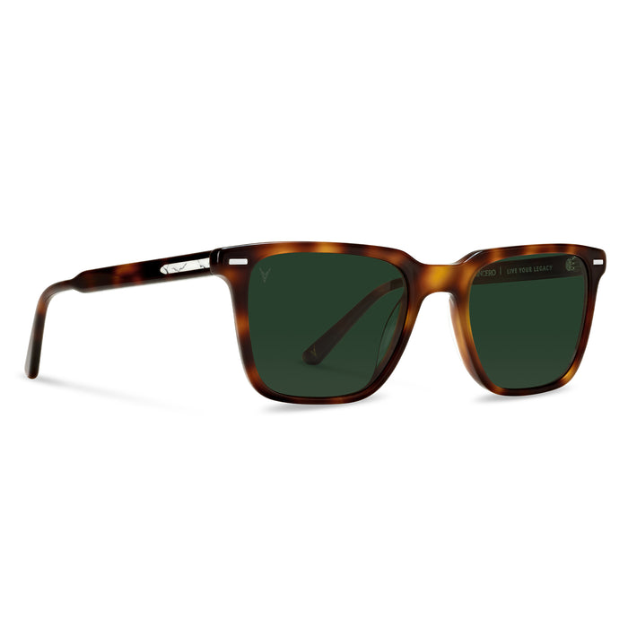 Sunglasses with tortoiseshell frame and dark lenses on a white background