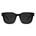 A pair of jet black, square-shaped sunglasses with polarized lenses and Italian acetate frame.