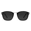 A pair of semi matte black sunglasses with smoke colored lenses and stainless steel temples.