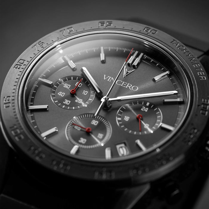 Gray Vincero watch with detailed face and brand name on a dark background