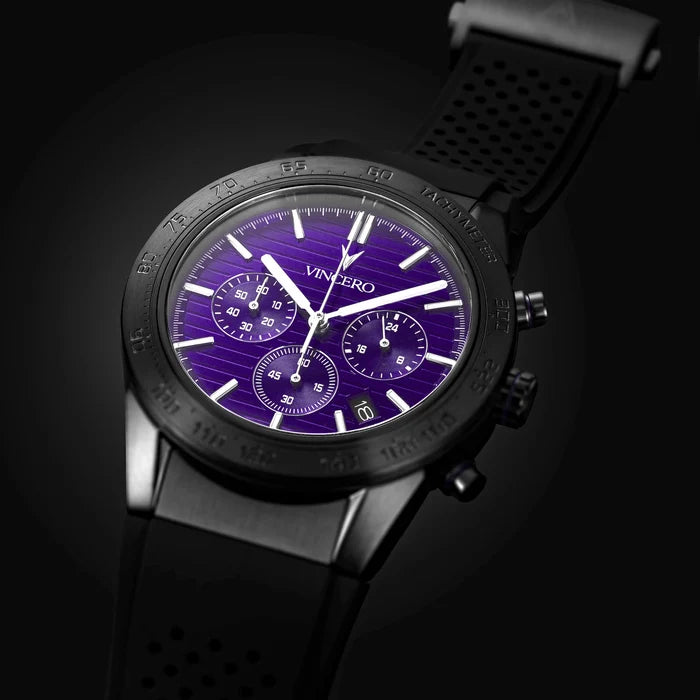 Watch with a purple face and black strap on a dark background