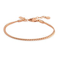 Rose gold bracelet on a white background