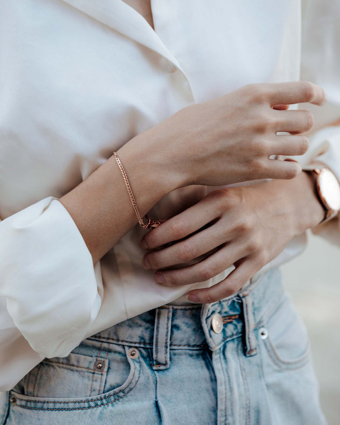 Serpentine rose gold on this bracelet on wrist