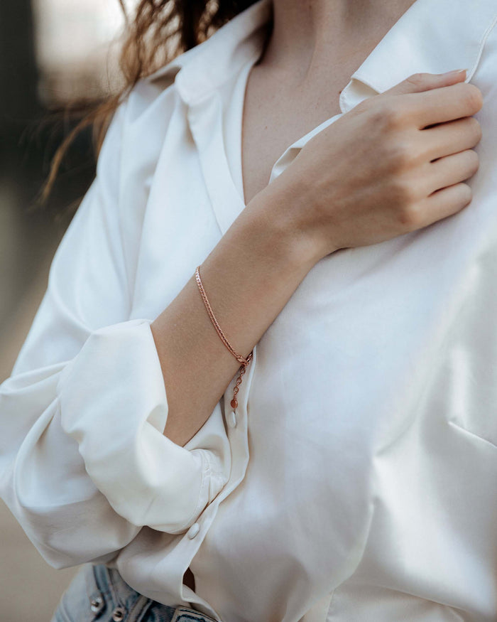 Serpentine rose gold women's bracelet on wrist