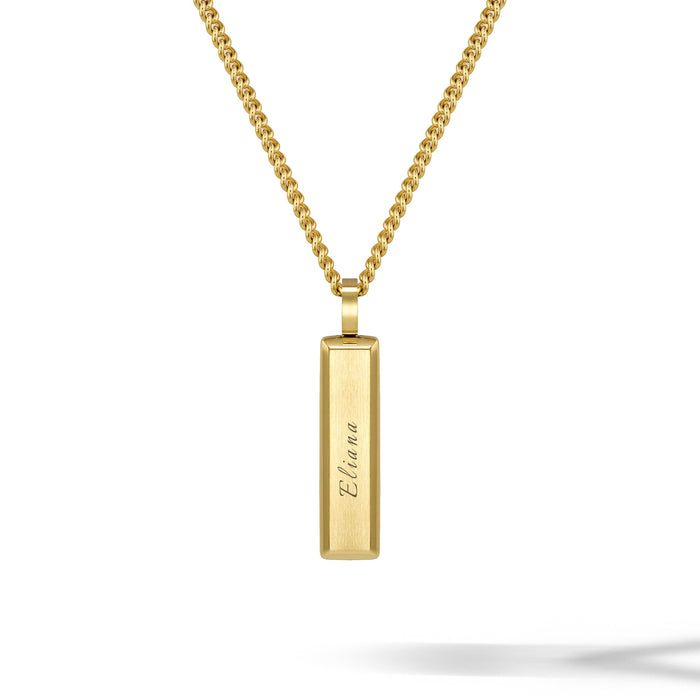 Gold necklace with a rectangular pendant on a white background