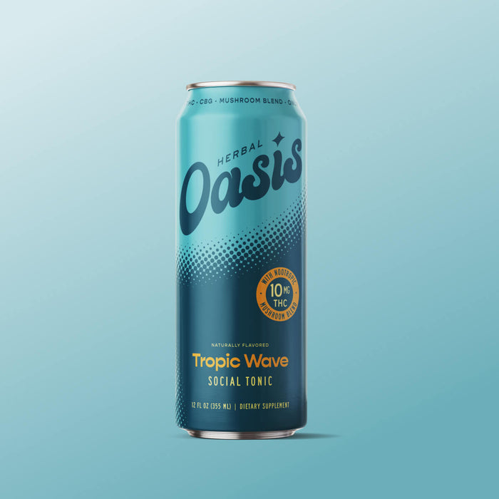 A can of cbdMD Tropic Wave social tonic with 10mg THC and mushroom blend on a blue background.