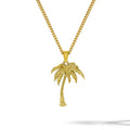 Gold palm tree necklace on a white background