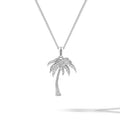 Silver palm tree pendant on a chain against a white background