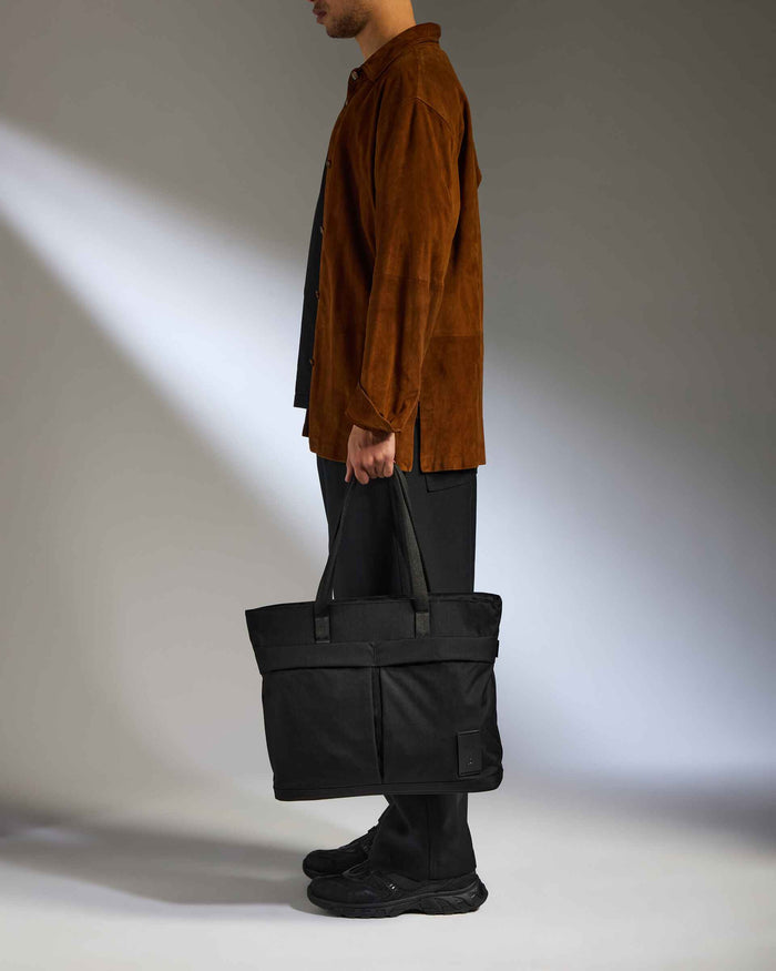 a man holding a bag
