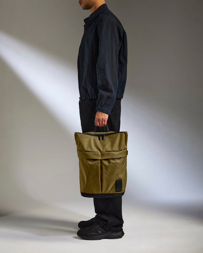 a man holding a bag