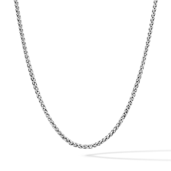 Silver chain necklace on a white background